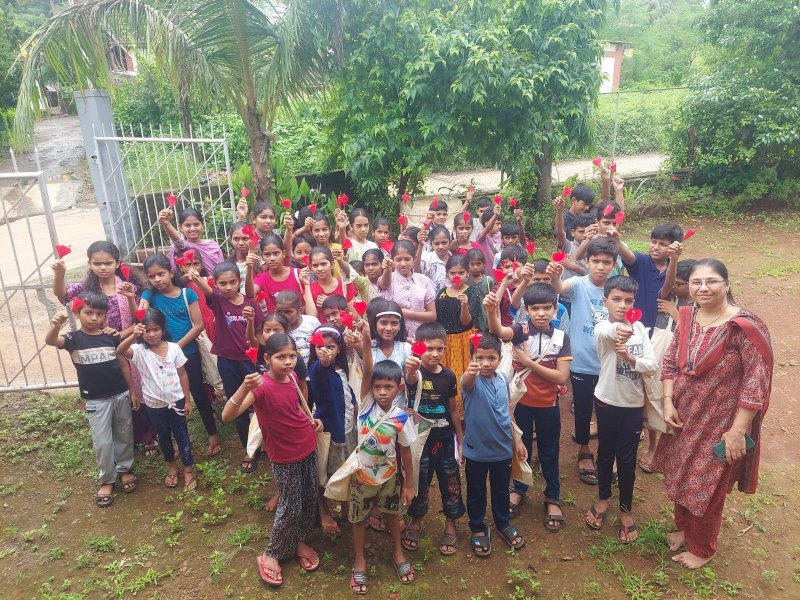 Children painting walls in Kuumba activity